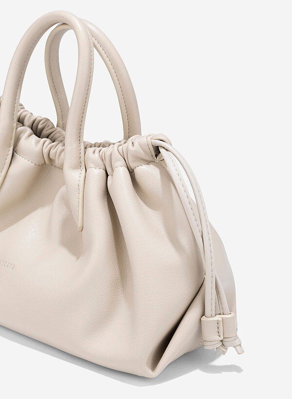 tui-xach-tay-phoi-day-rut---tot-0186---mau-kem__78897__1732790179-medium